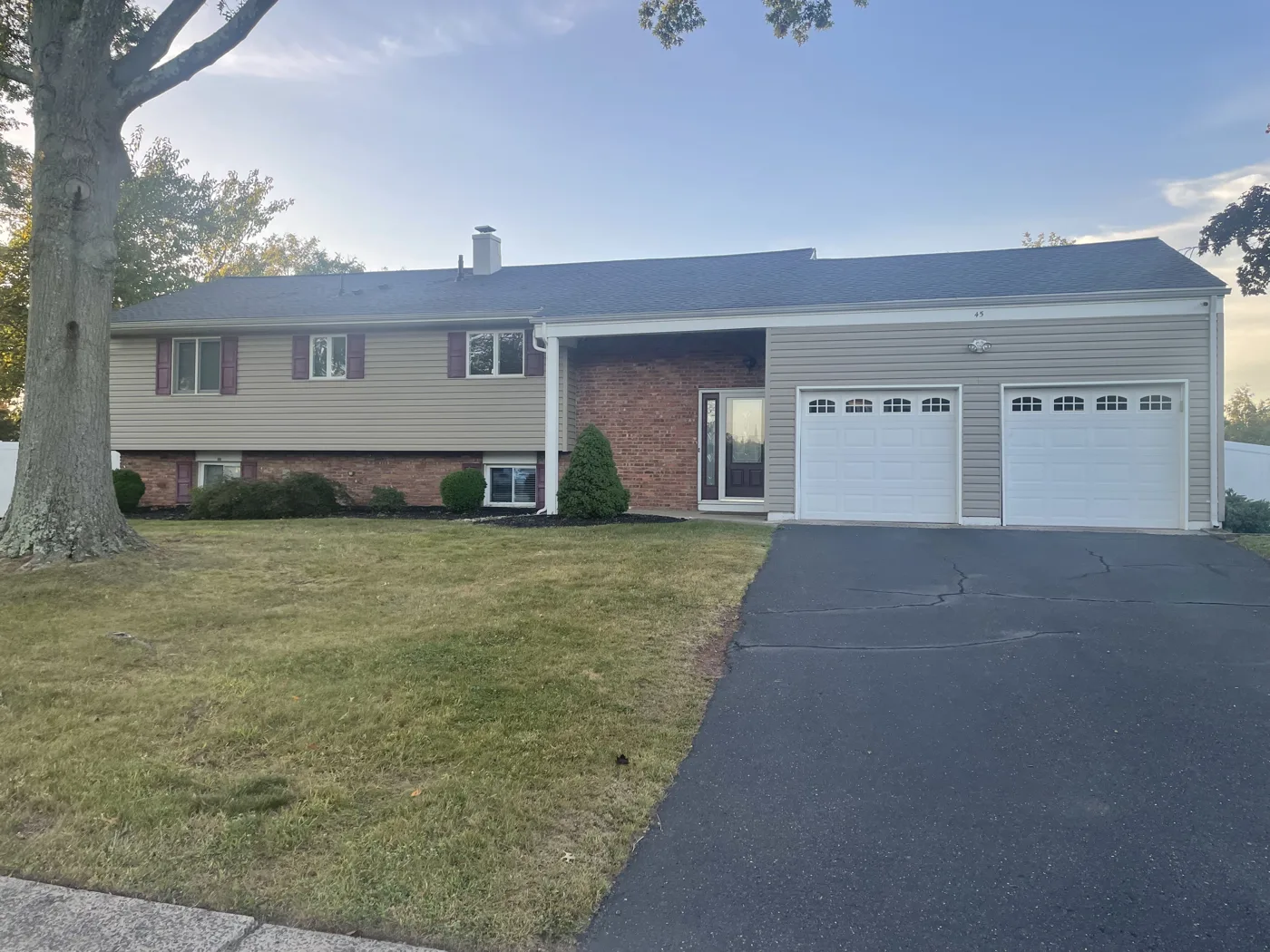 A real customer's house photographed in daylight, before any work
